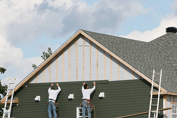Professional Siding Installation technician working in Salem, MA